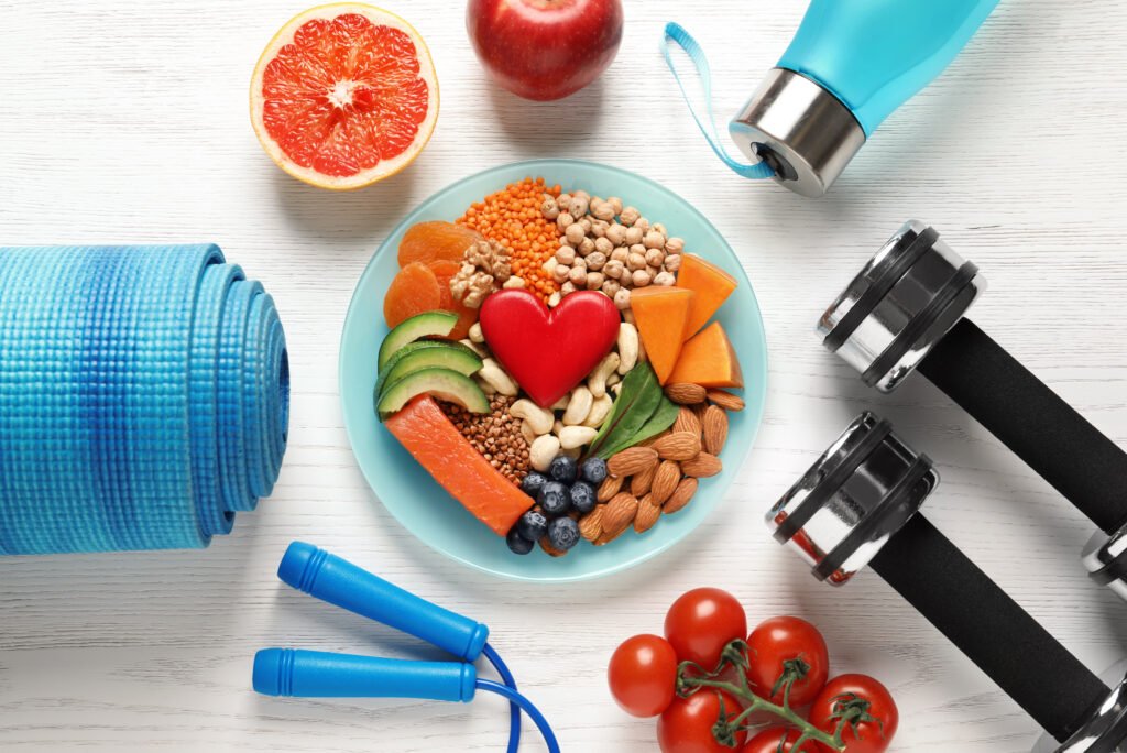 Plate,With,Heart-healthy,Products,And,Sports,Equipment,On,Wooden,Background,