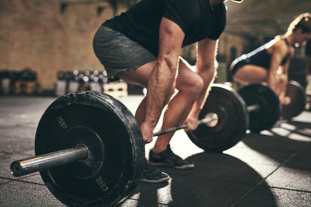 Fit,People,Doing,Deadlift,Exercise,In,Gym.,Horizontal,Indoors,Shot